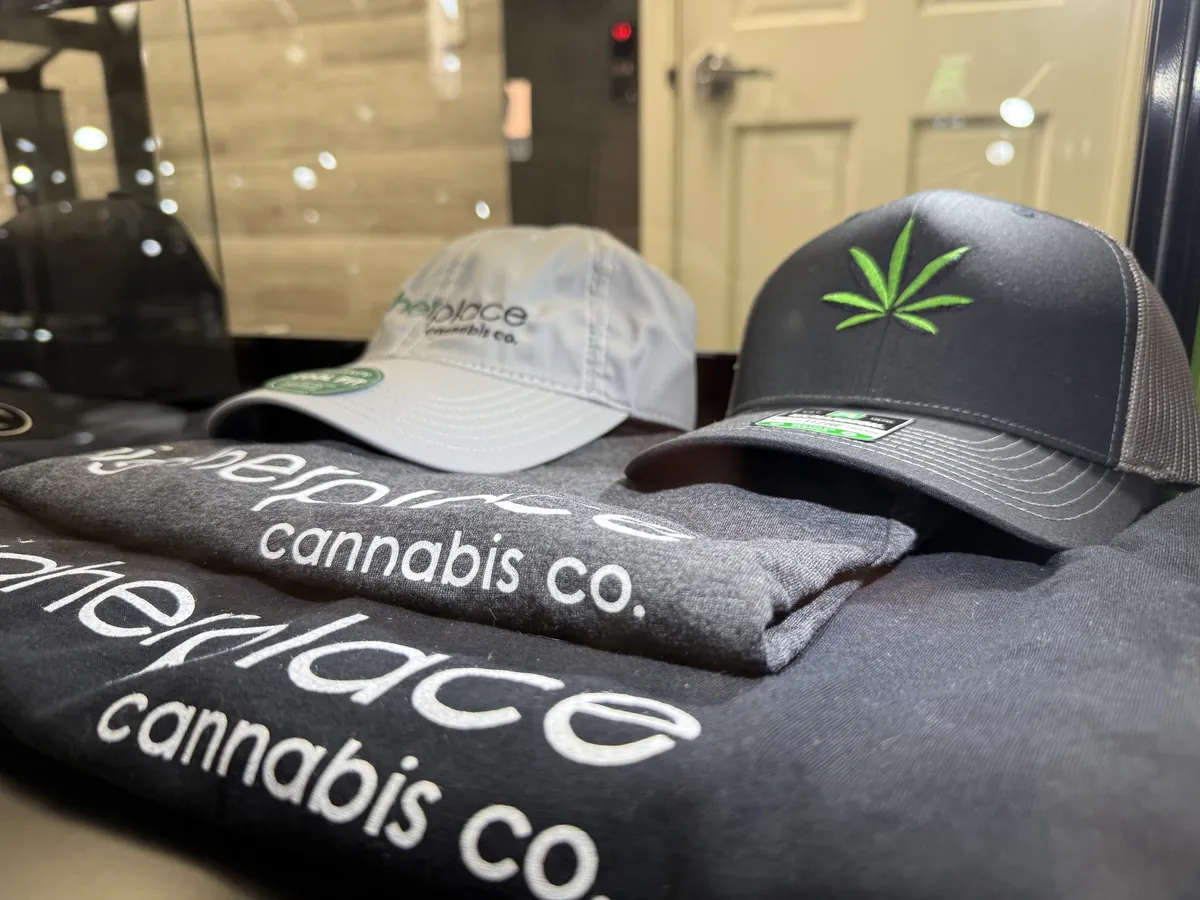 Dispensary branded hats apparel display
